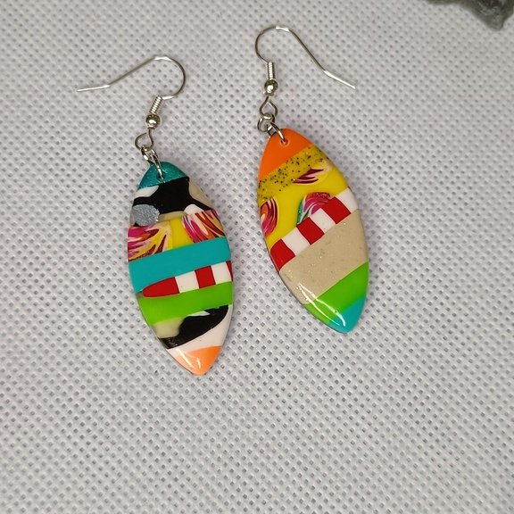 Boucles d'oreilles fantaisies artisanales artistiques stylées