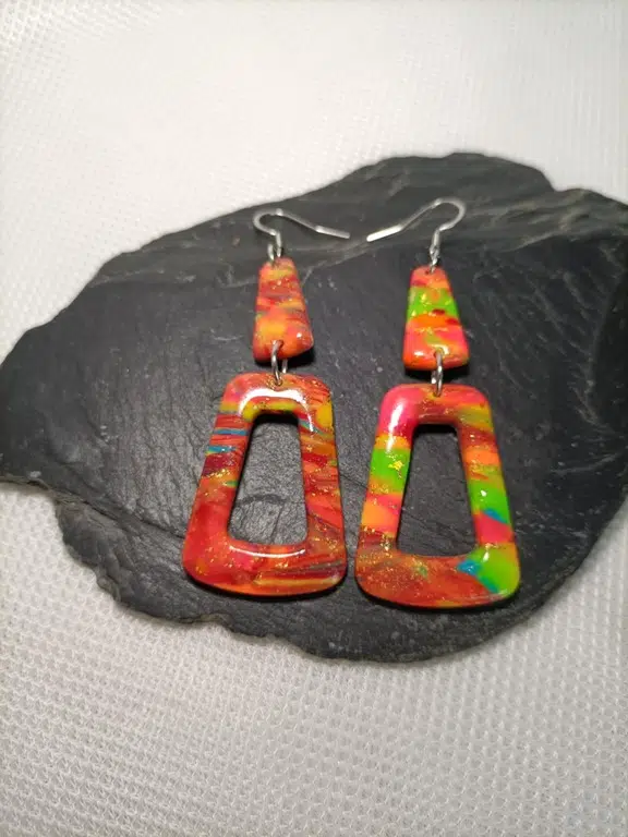 Boucles d'oreilles fluorescente de créateur