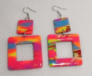 boucles d'oreilles de créateur fluorescente