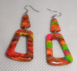Boucles d'oreilles fluorescente de créateur